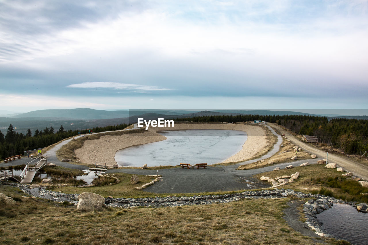 PANORAMIC SHOT OF ROAD ALONG LANDSCAPE