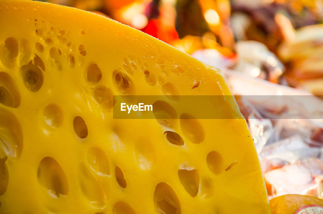 Close-up of gruyere cheese for sale in market