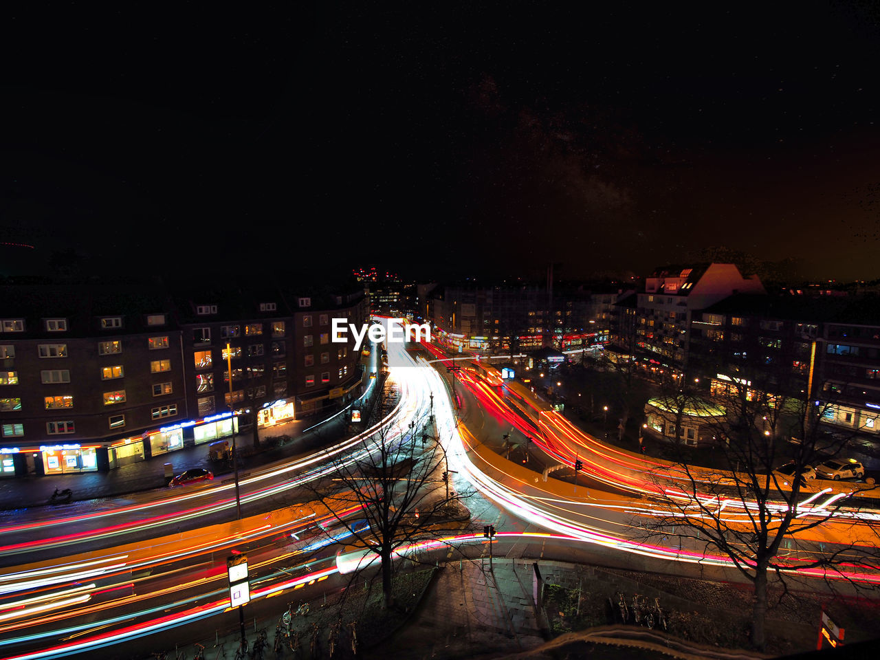 High angle view of light trails on road at night