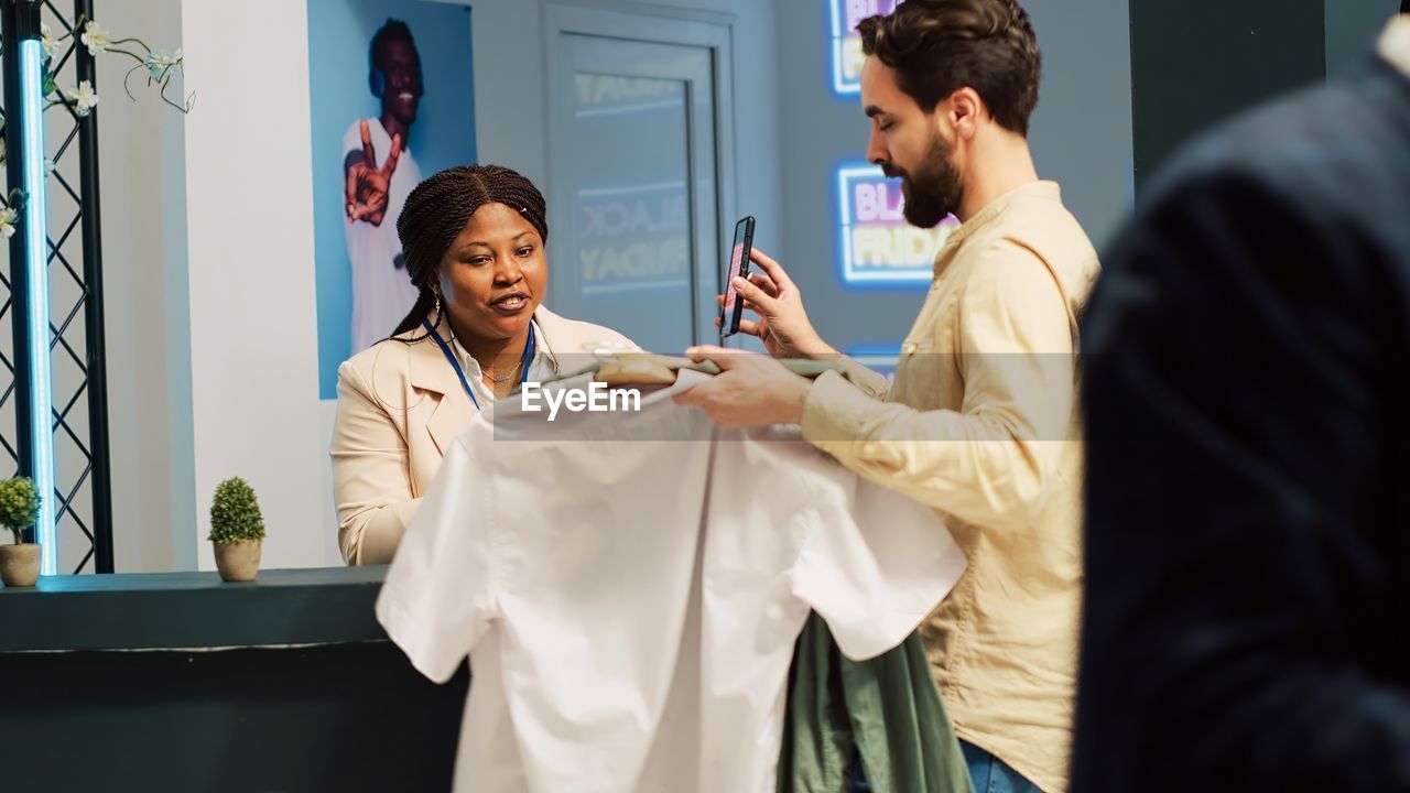 side view of female doctor examining patient in hospital