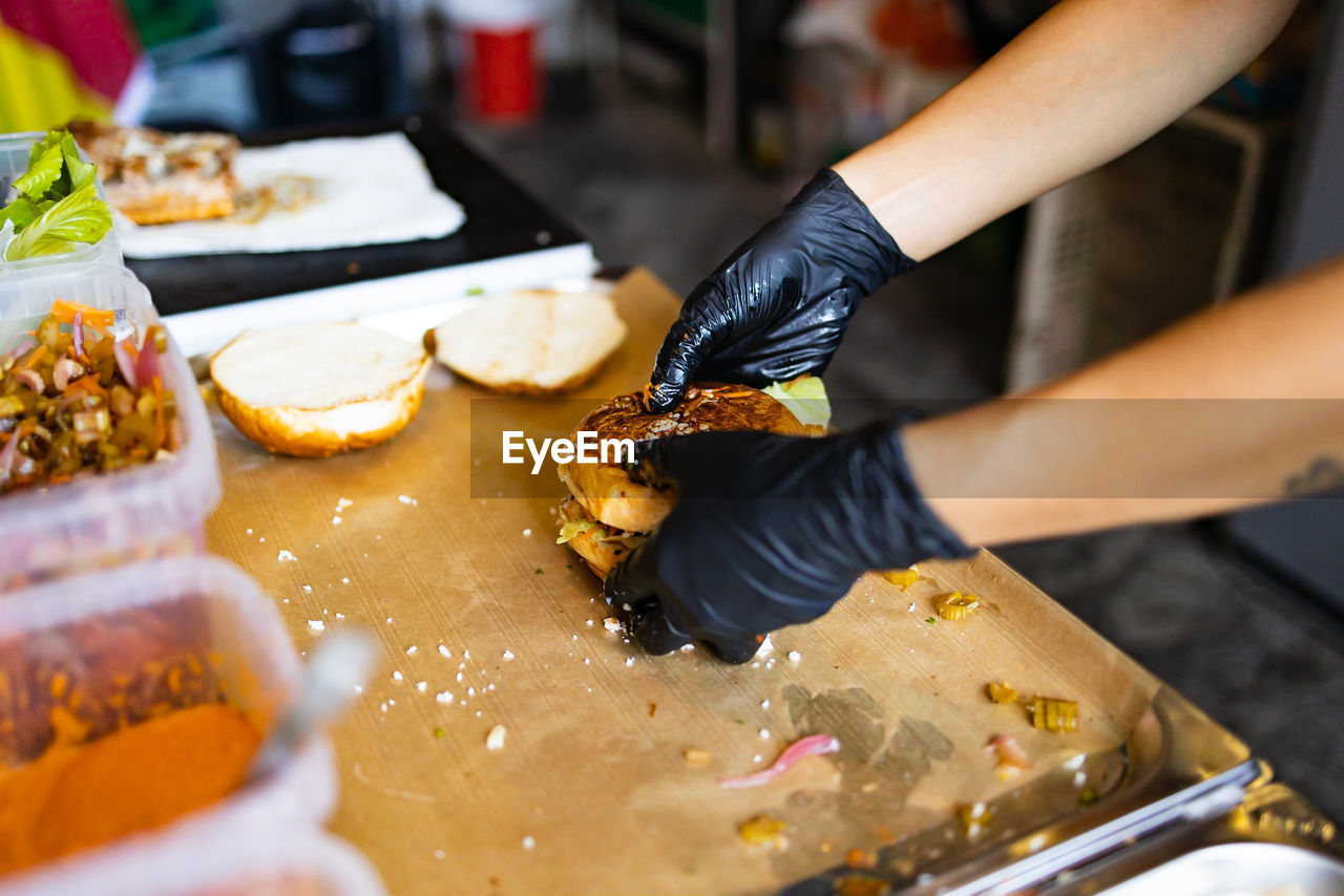 Midsection of man preparing food