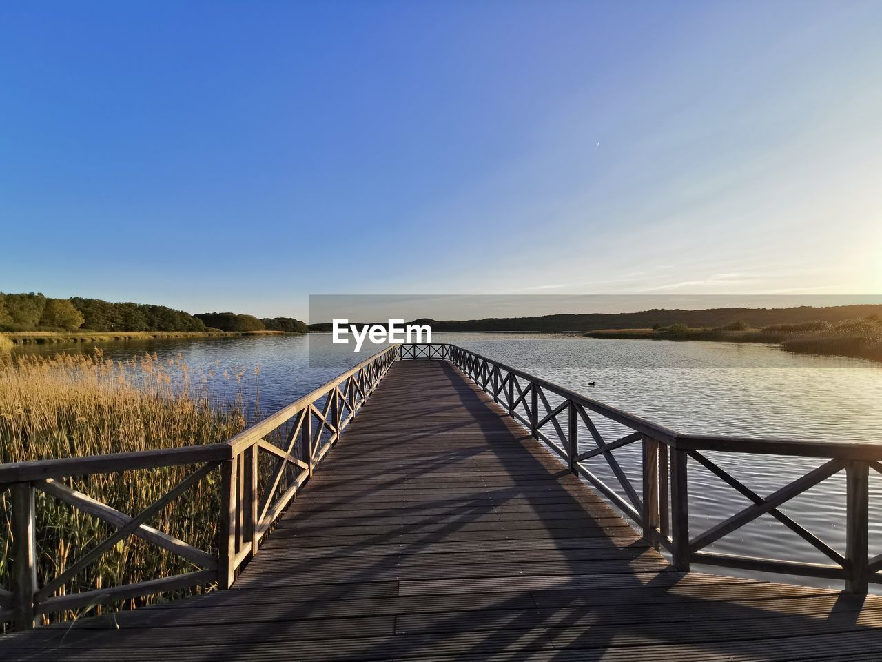 Scenic view of lake against clear sky