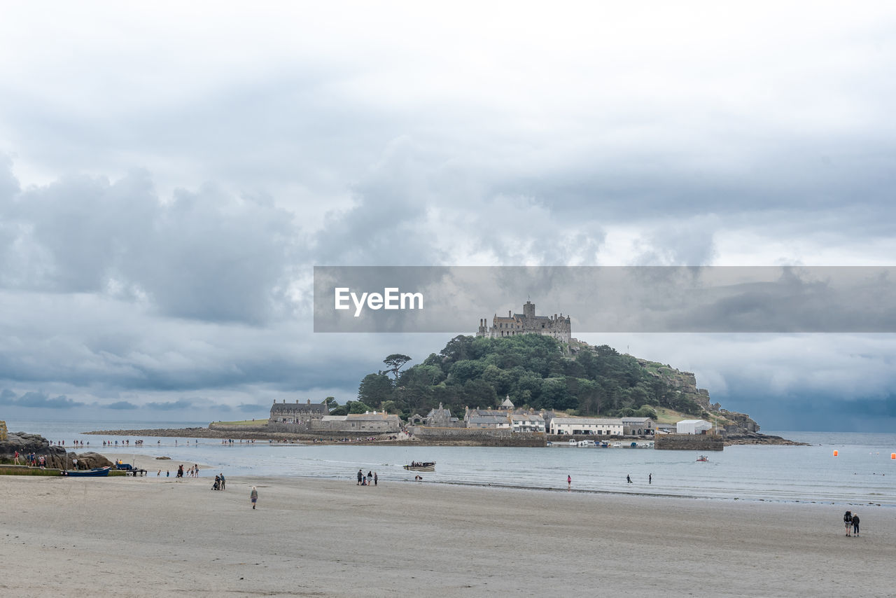 The counterpart to the french island is st michaels mount in cornwall. 