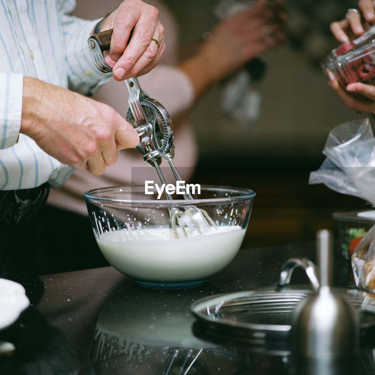 Midsection of man preparing food