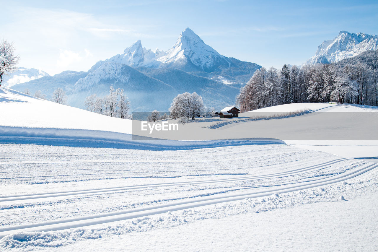 Snow covered mountains against sky