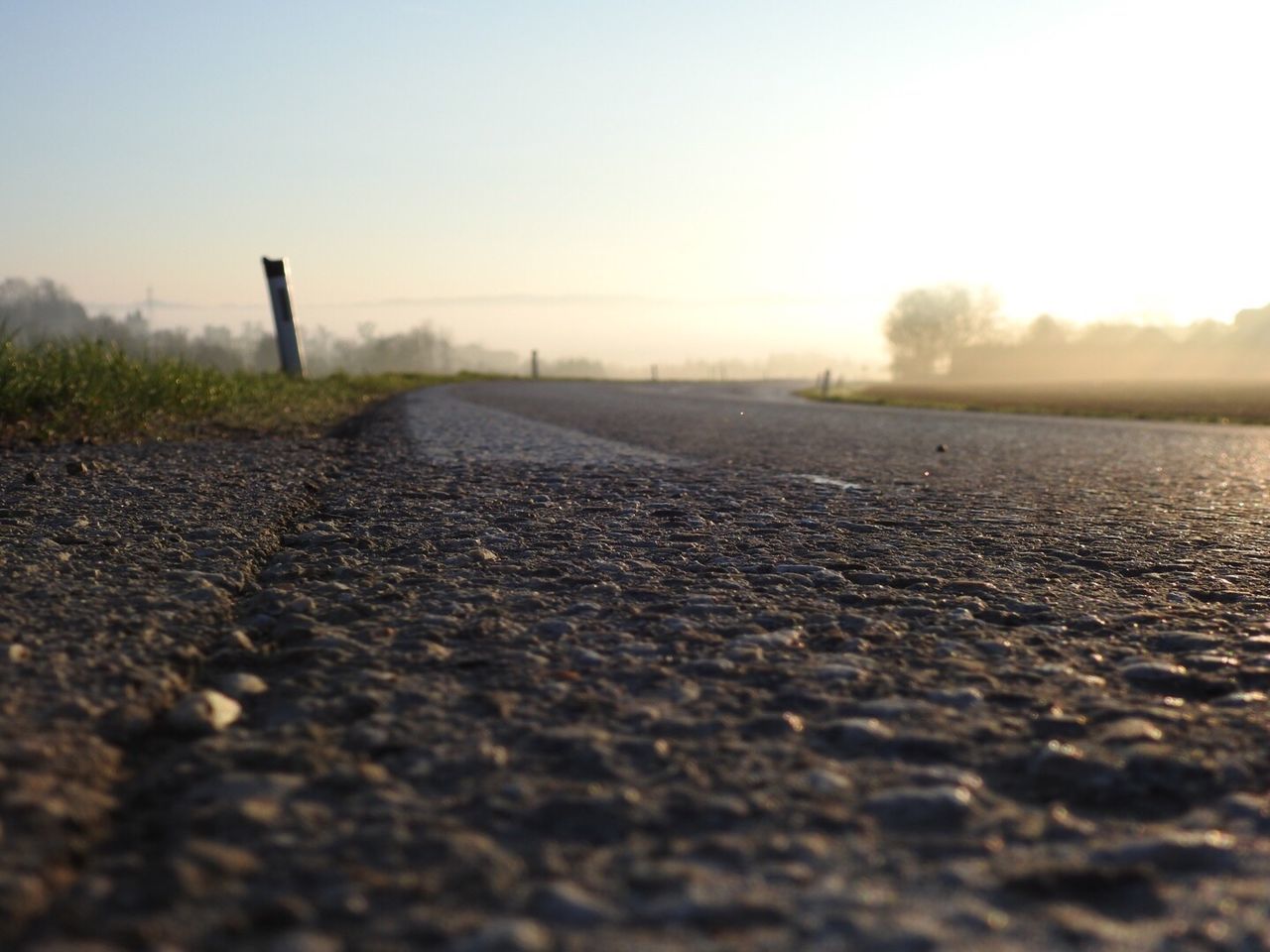 Surface level of landscape against clear sky