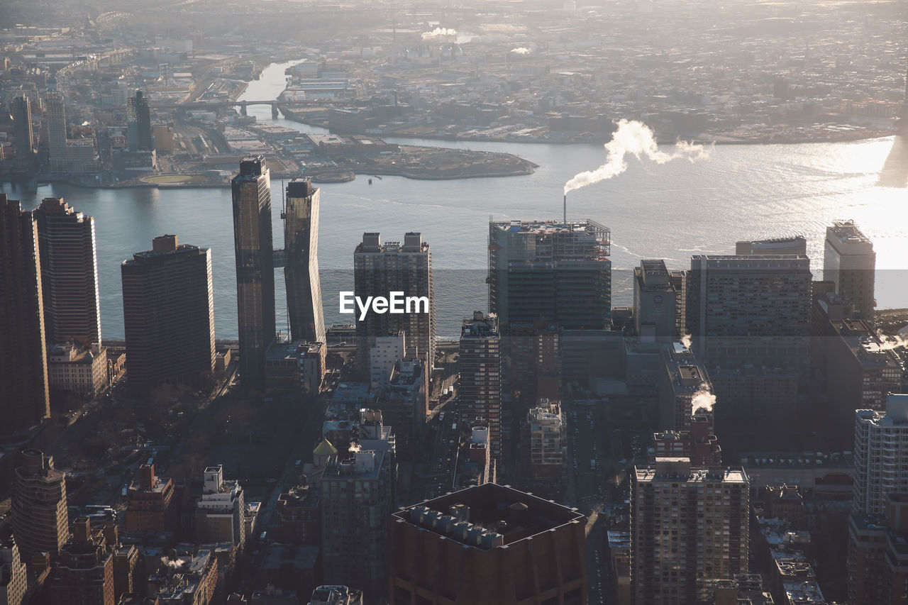 High angle view of city at sunset