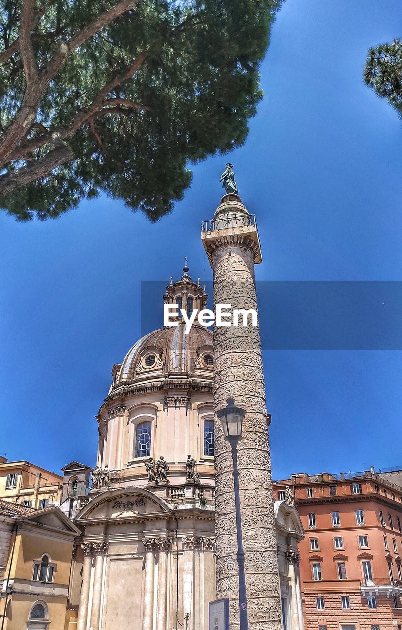 LOW ANGLE VIEW OF BUILDING AGAINST THE SKY