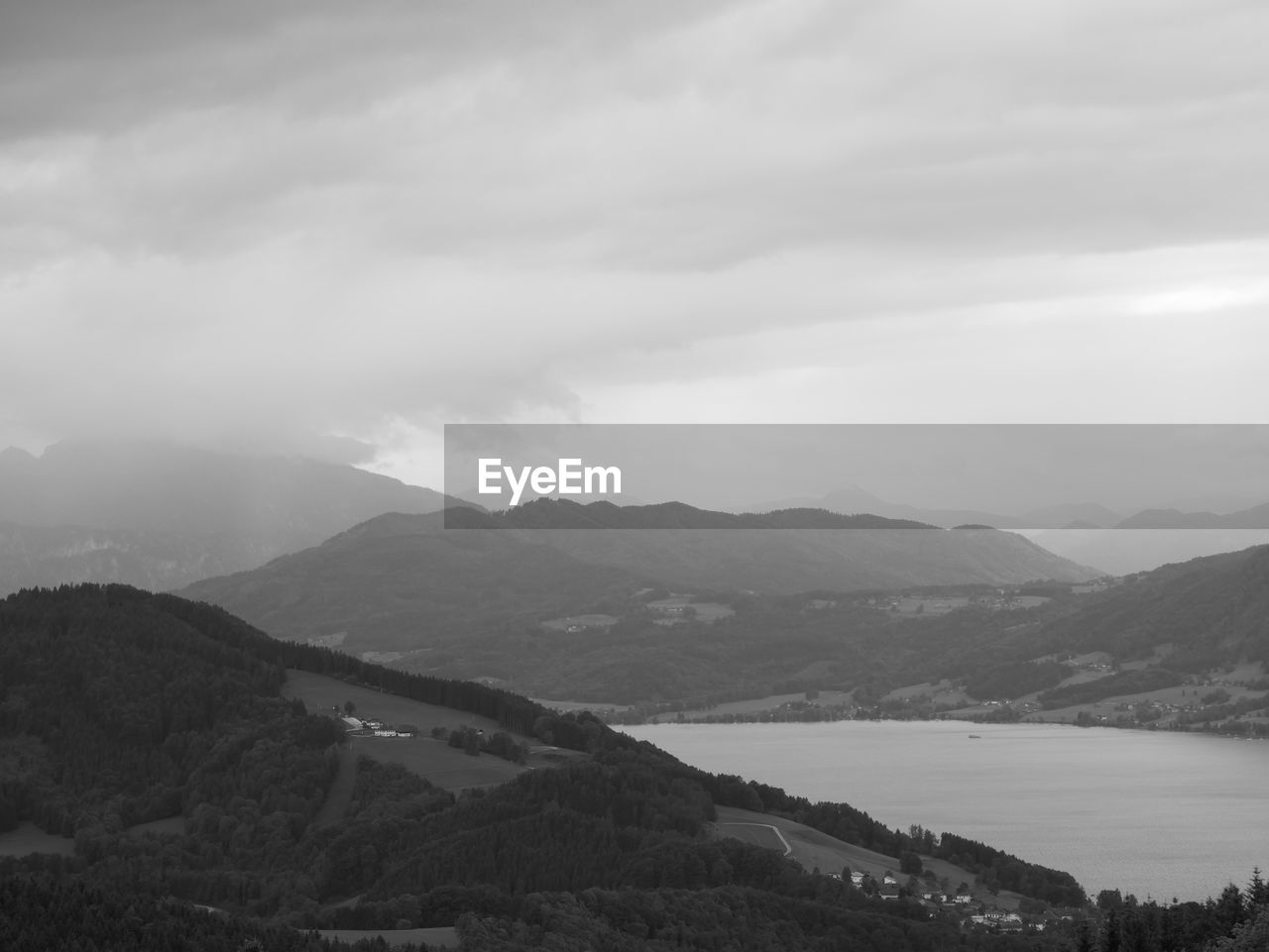 RIVER AND MOUNTAINS AGAINST SKY