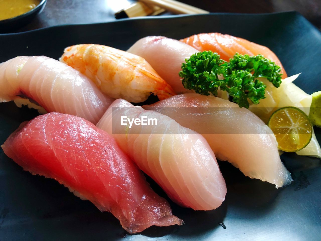CLOSE-UP OF SUSHI SERVED ON PLATE