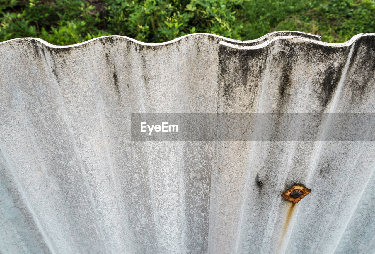 The surface texture of outdoor fence or wall made by old roof tile