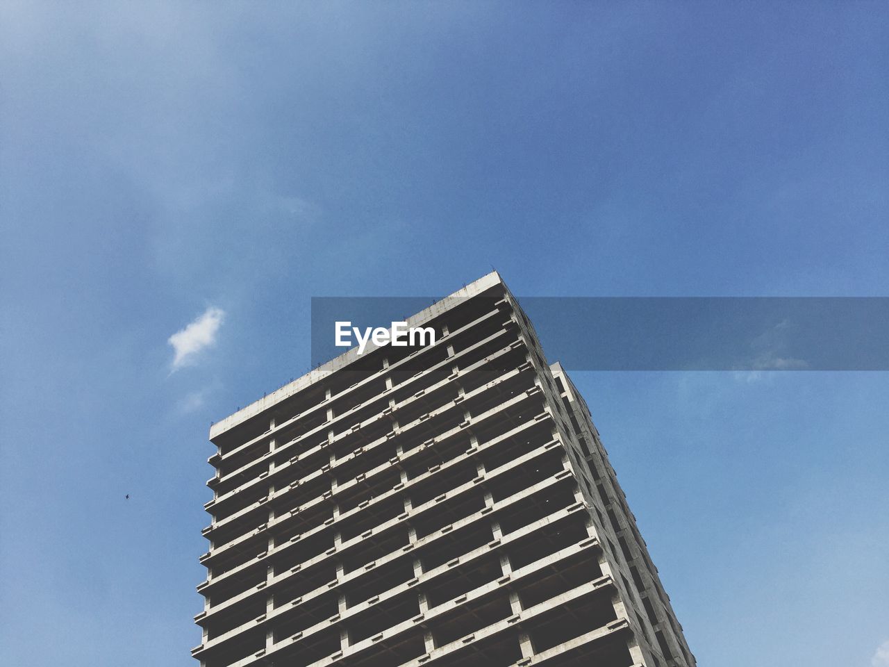 Low angle view of modern building against sky