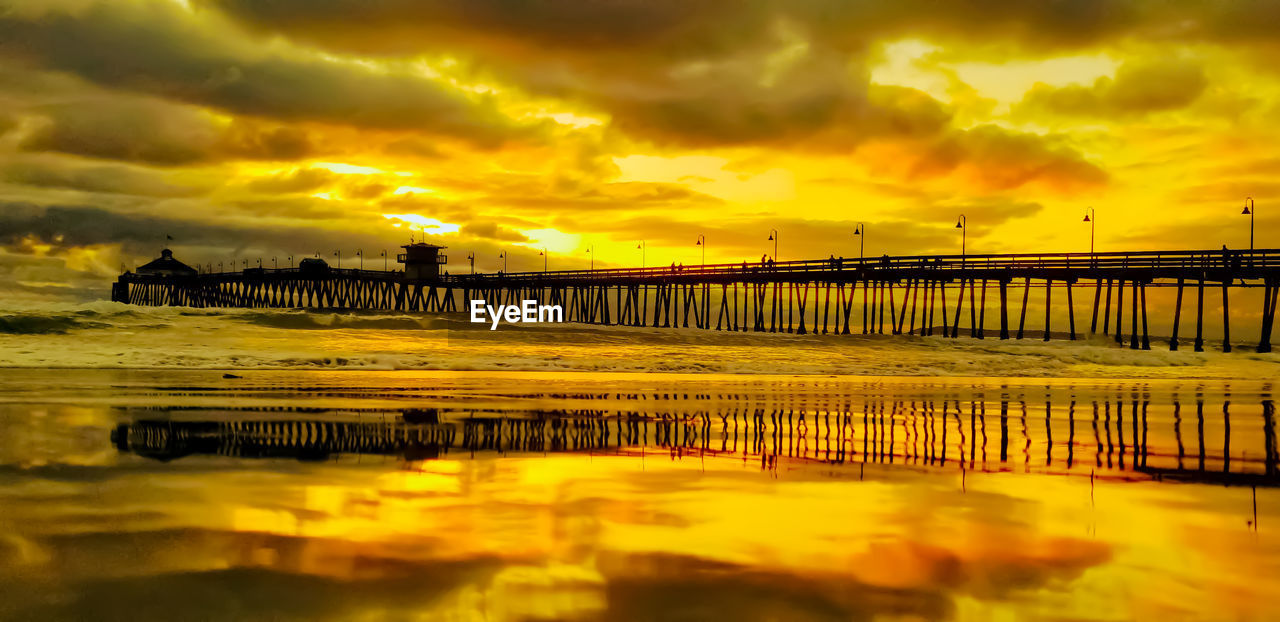 BRIDGE AGAINST SKY DURING SUNSET