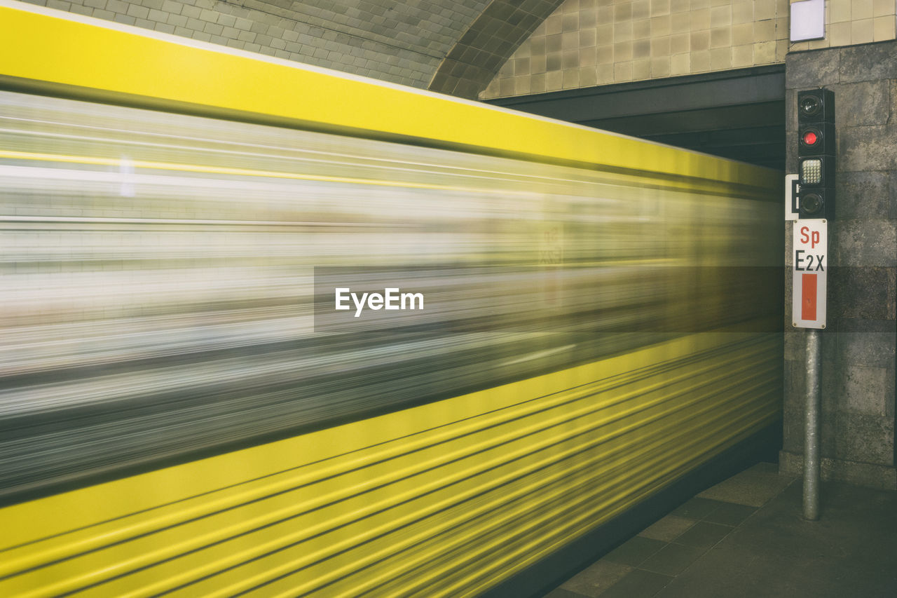 Blurred motion of train at subway station