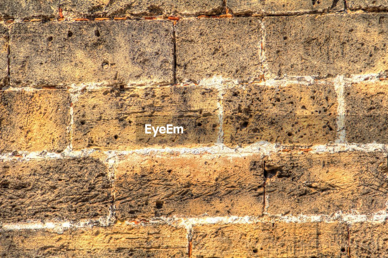 FULL FRAME SHOT OF BRICK WALL WITH BRICK WALL