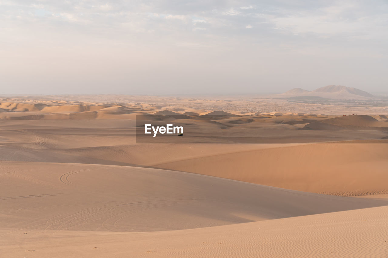 Scenic view of desert against sky