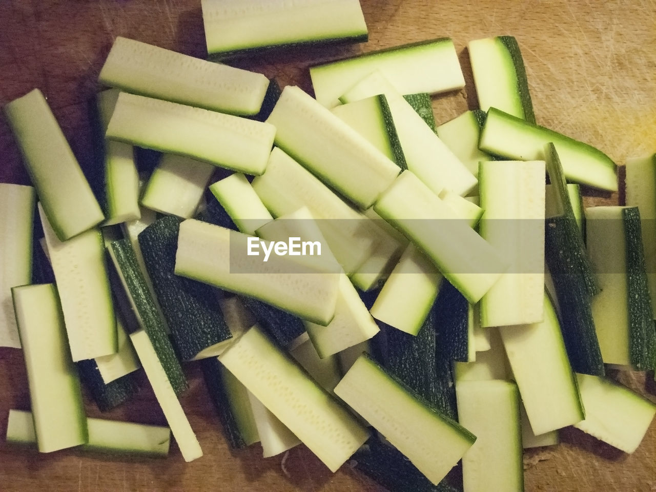 Close-up of zucchini slices on table