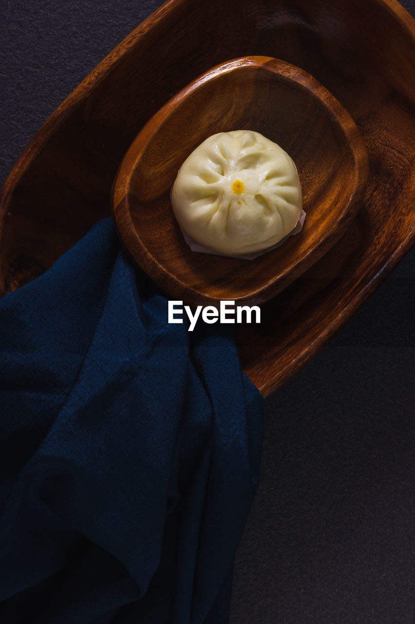 Still life with steamed bun on top view