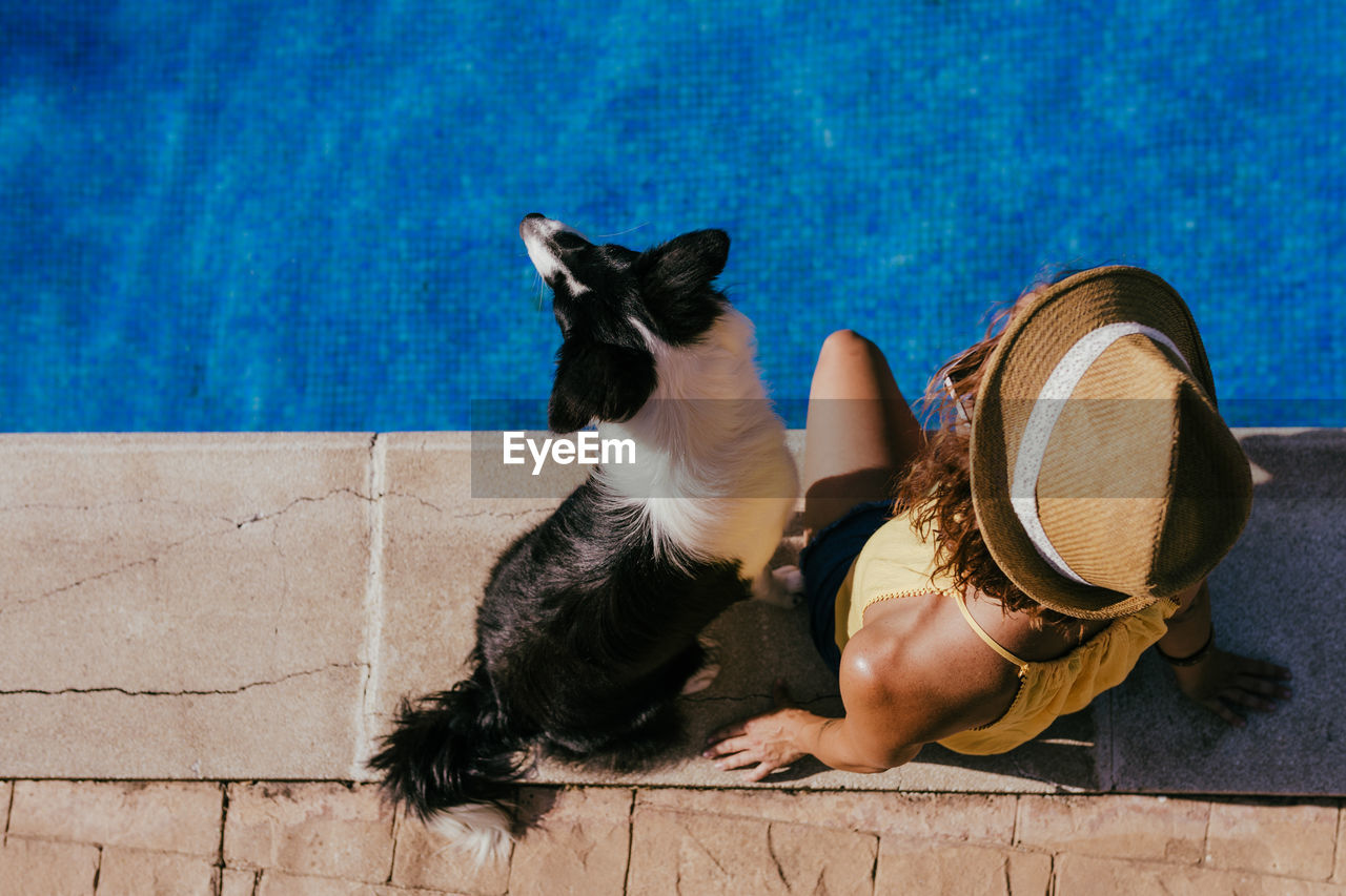 People relaxing in swimming pool