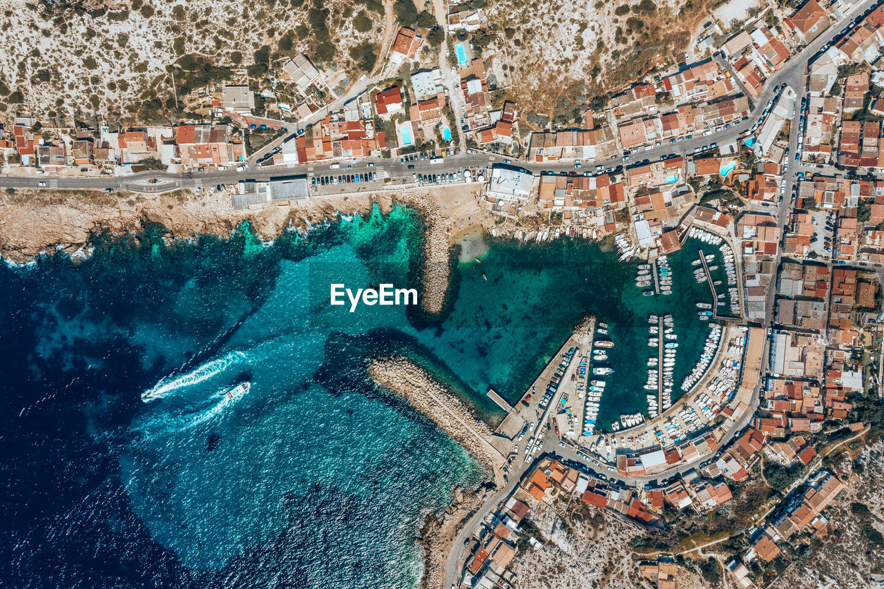 Aerial view of residential district by sea