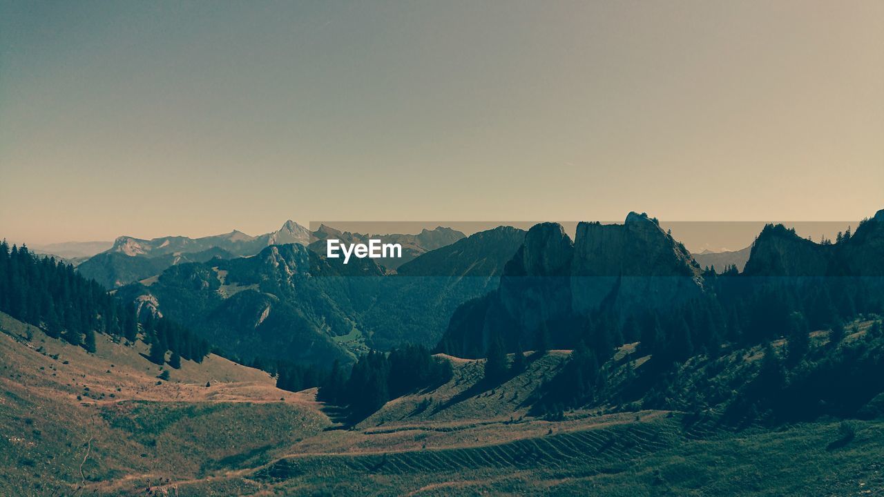 Panoramic view of landscape against clear sky during sunset