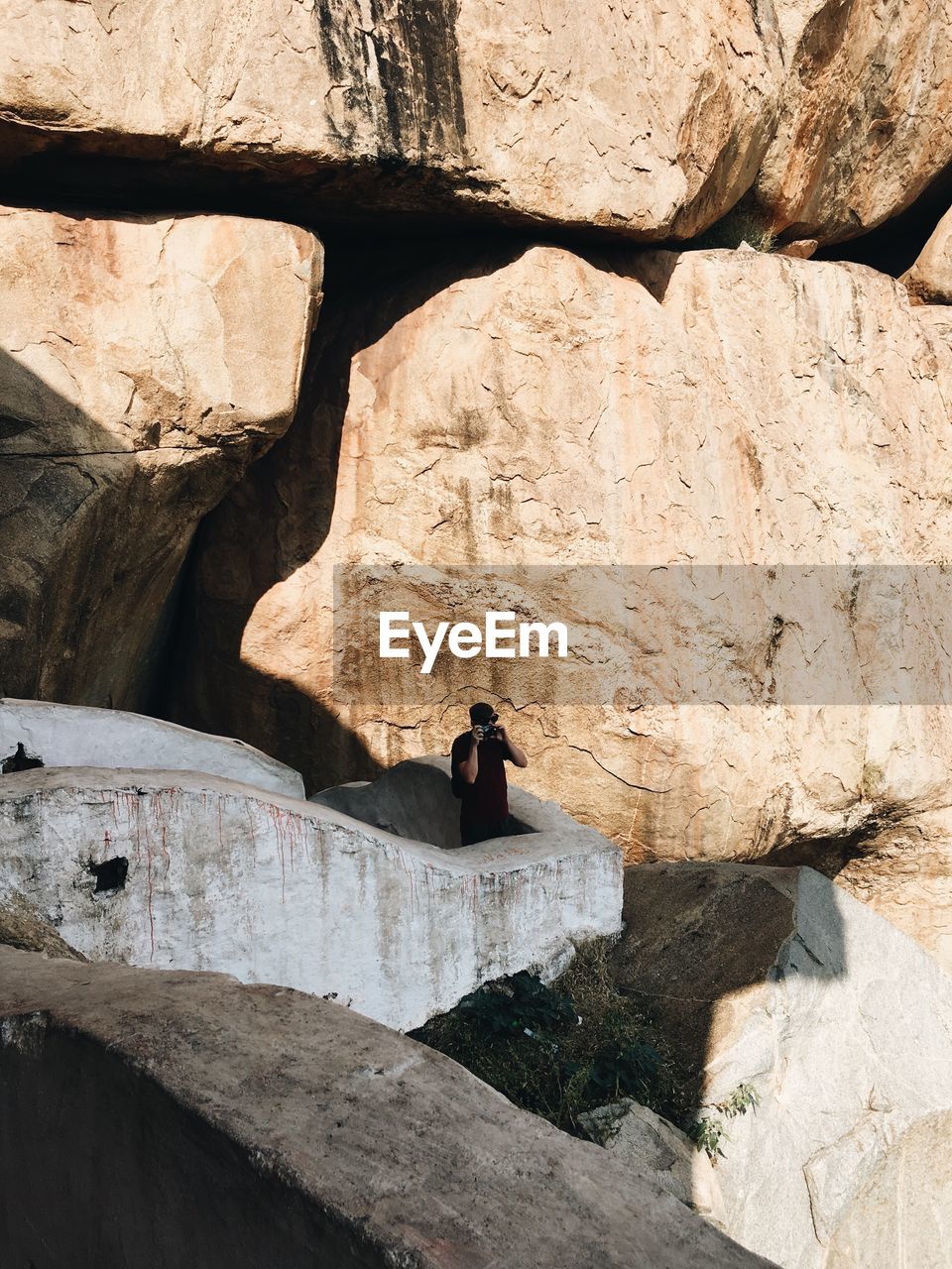 Man standing on rock formation