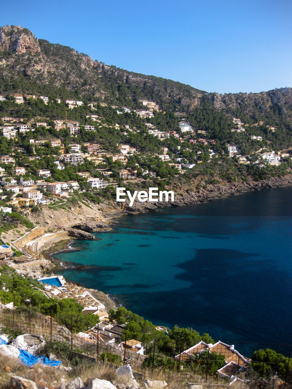 SCENIC VIEW OF BEACH AGAINST CLEAR SKY