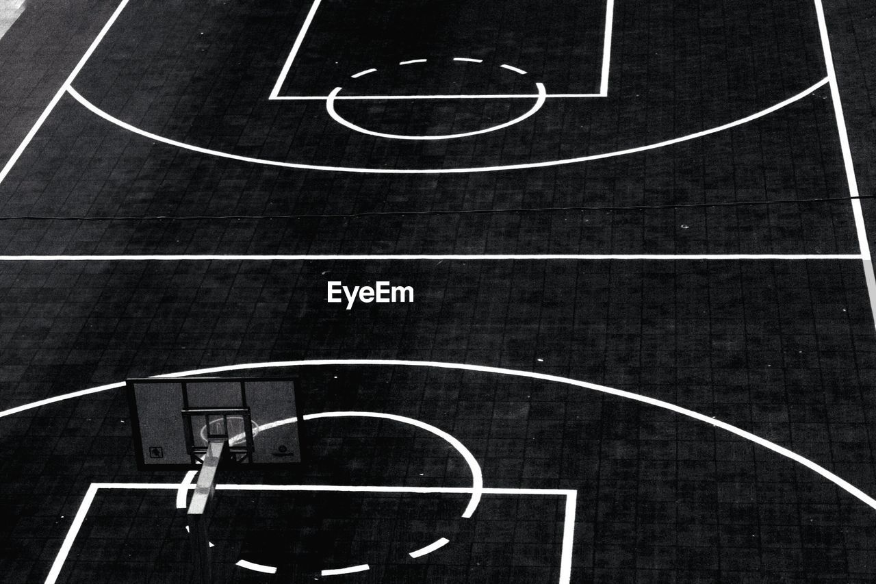 HIGH ANGLE VIEW OF BASKETBALL HOOP AGAINST SKY
