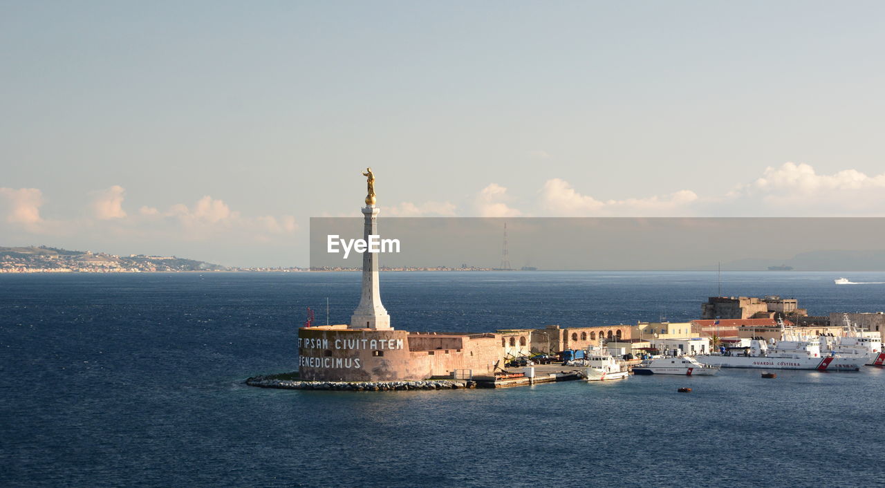 SHIP IN SEA AGAINST SKY