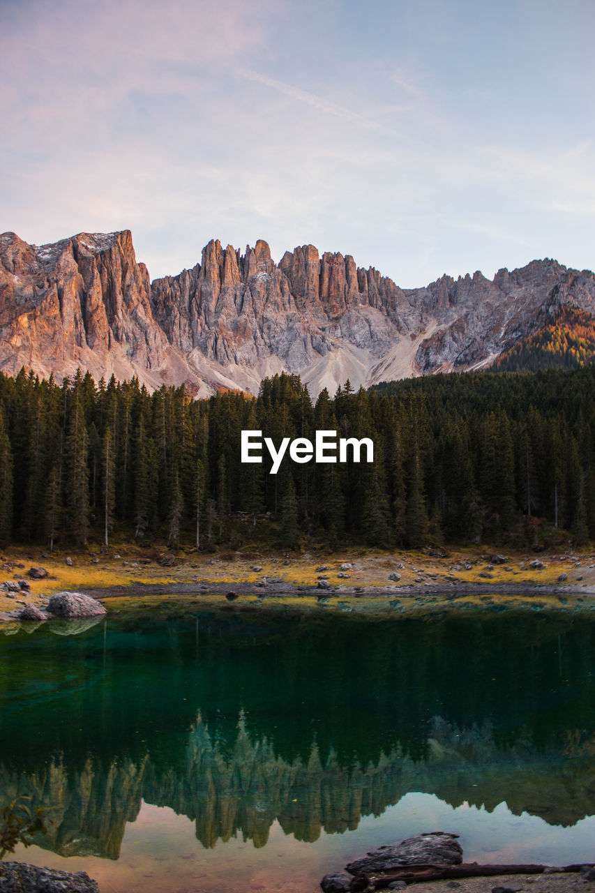 Scenic view of lake against mountains and sky