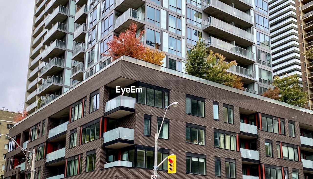 LOW ANGLE VIEW OF RESIDENTIAL BUILDING