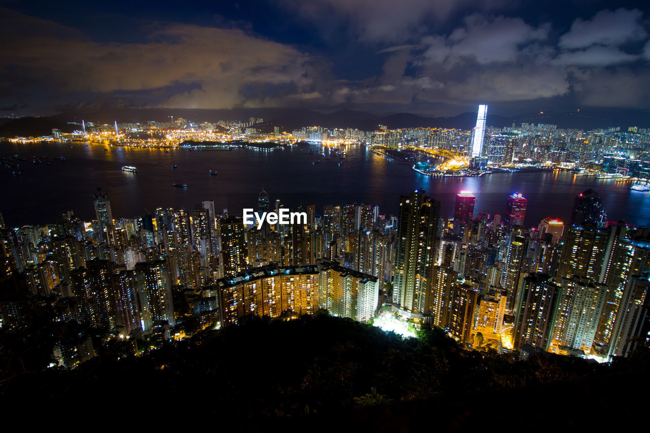 High angle view of illuminated buildings at night