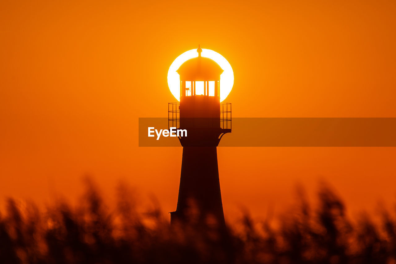 Sunrise and lighthouse