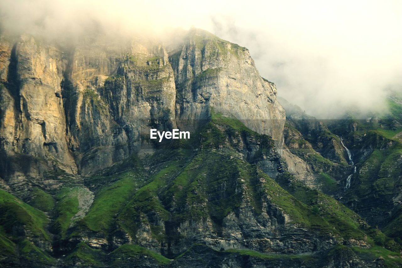 Scenic view of rocky mountains against sky