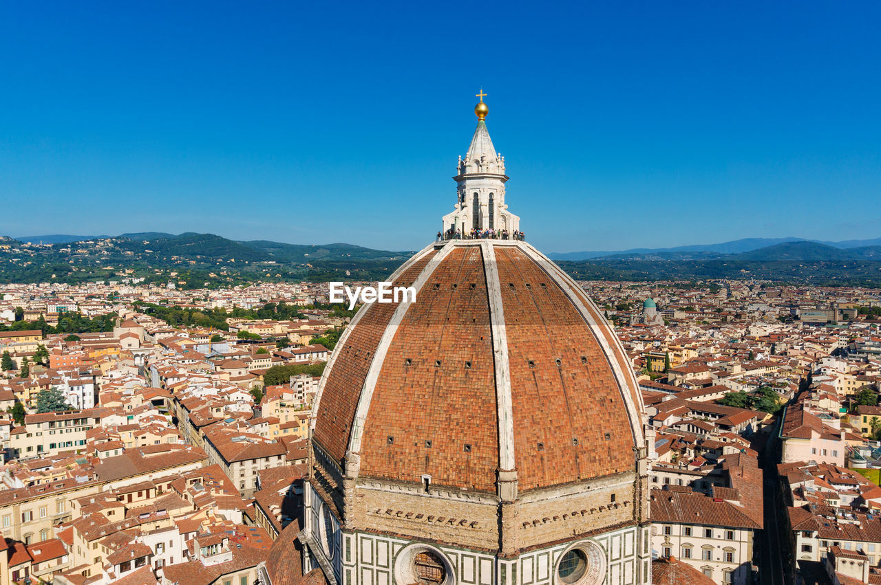 Aerial panoramic view of dome of santa marial del fiore basilica with historic buildings