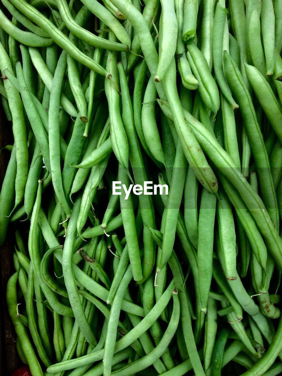 Full frame shot of green beans for sale at market stall