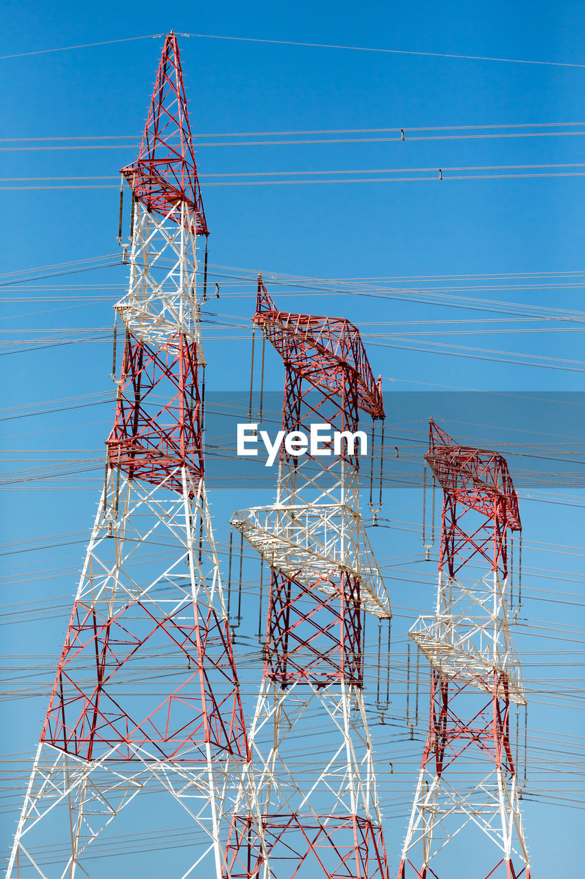 LOW ANGLE VIEW OF ELECTRICITY PYLON AGAINST SKY