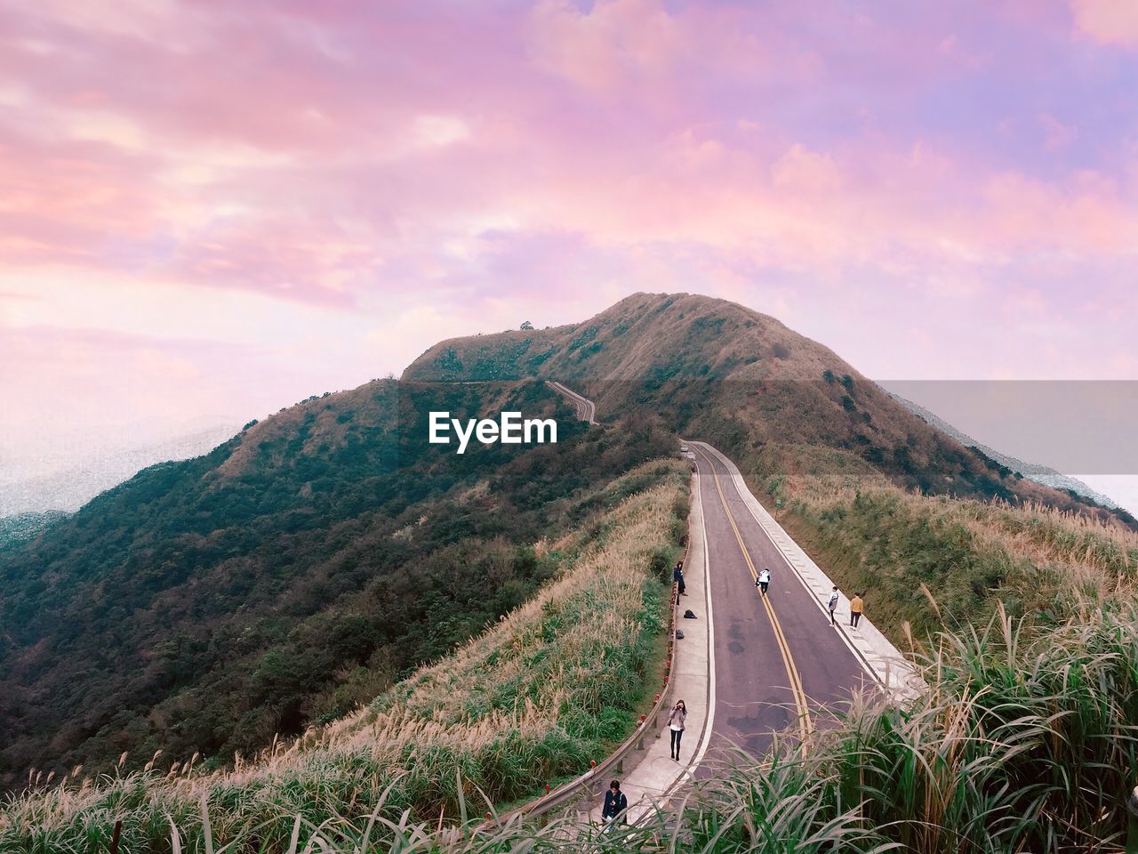 Scenic view of mountain road against sky