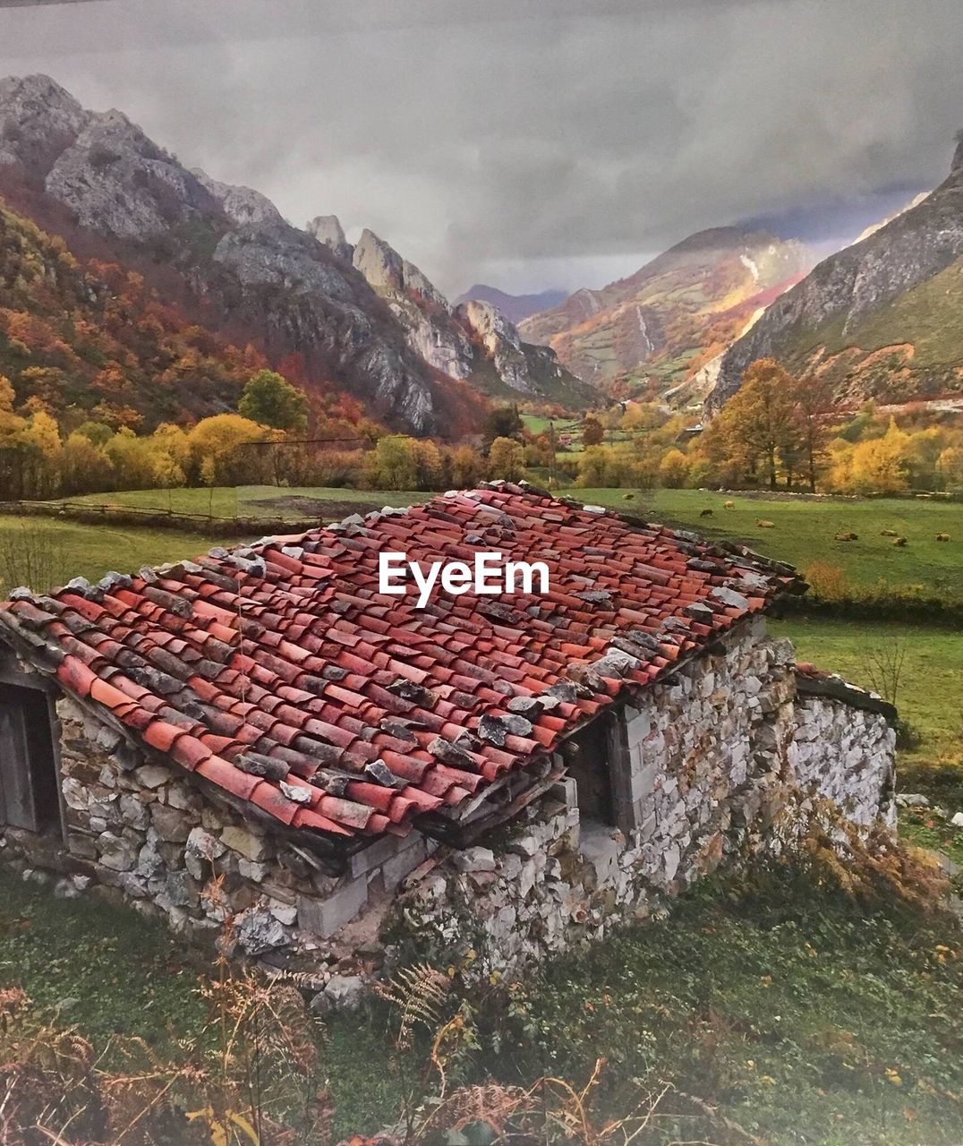 Built structure on mountain against sky