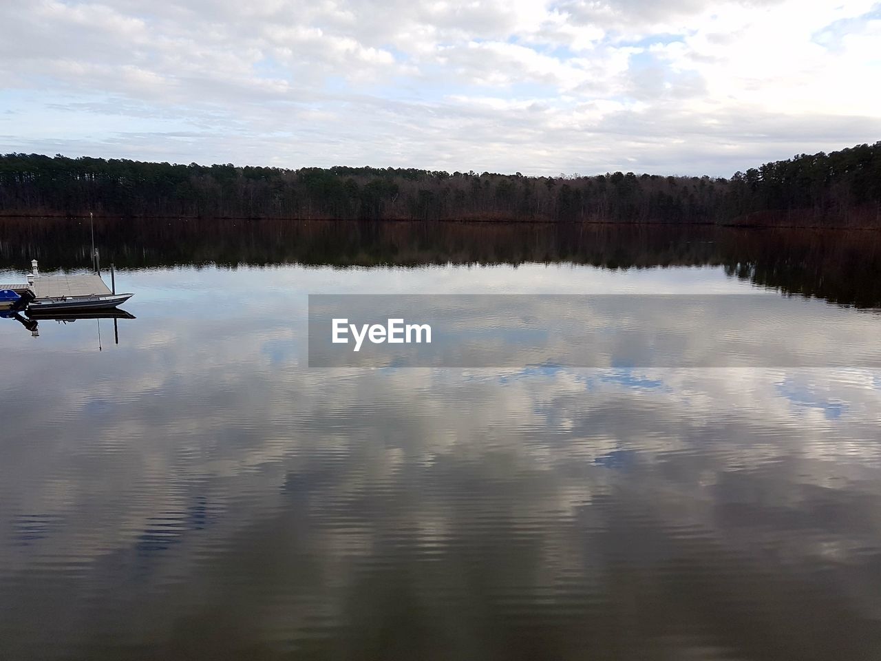 REFLECTION OF SKY ON LAKE