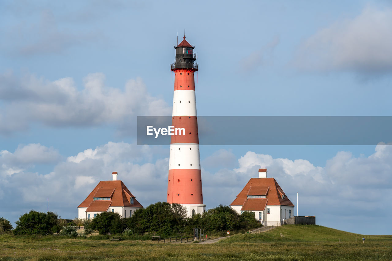 LIGHTHOUSE AGAINST SKY