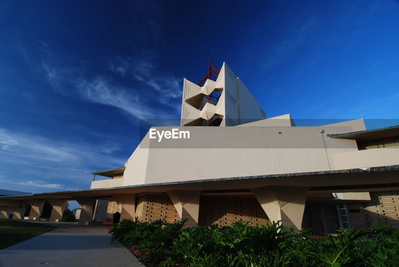 BUILT STRUCTURES AGAINST BLUE SKY