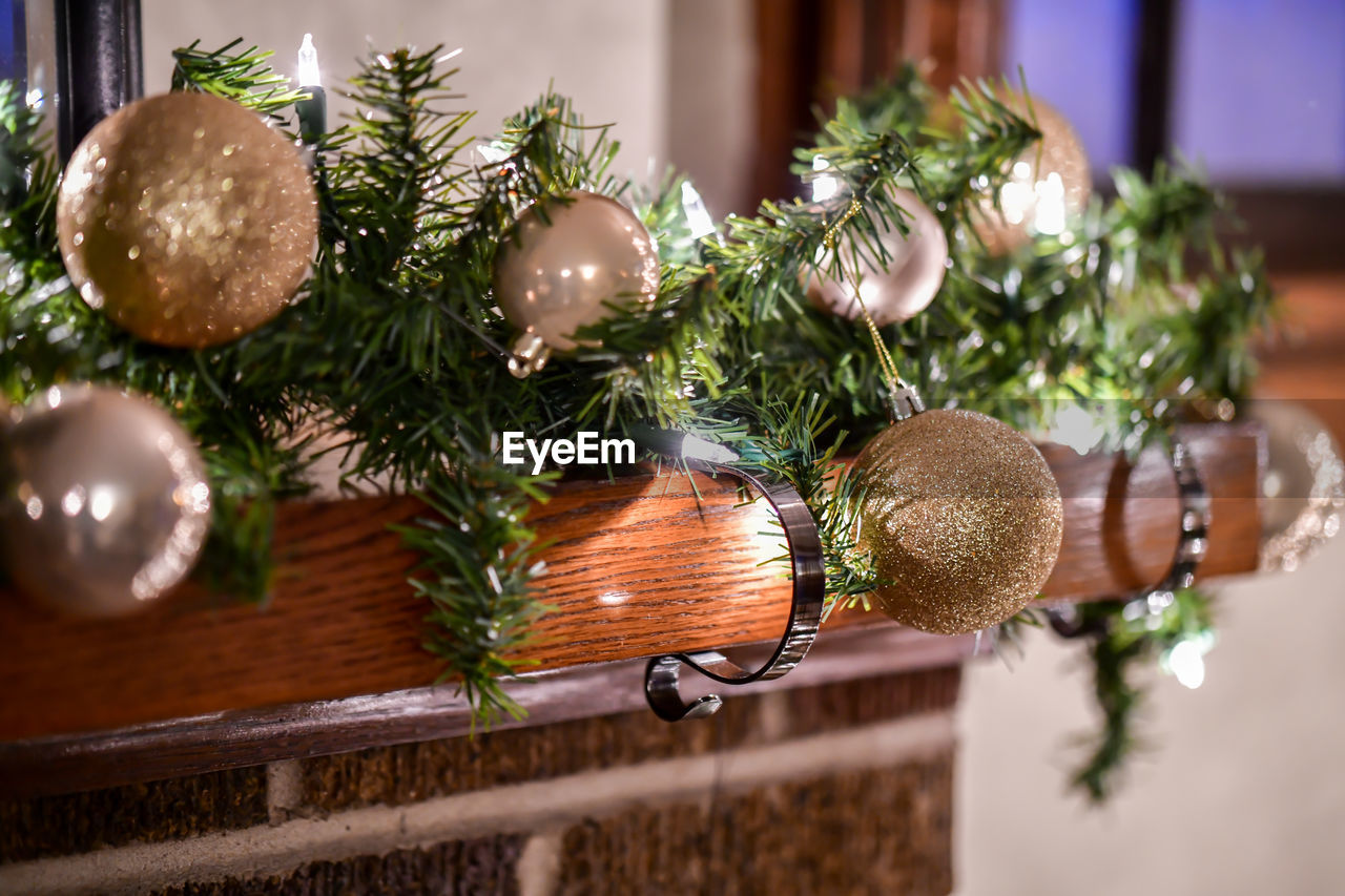 Close-up of christmas decorations on mantle 