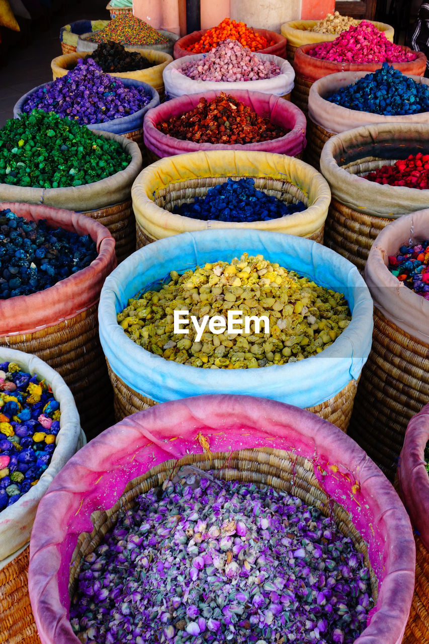 HIGH ANGLE VIEW OF MULTI COLORED VEGETABLES IN MARKET