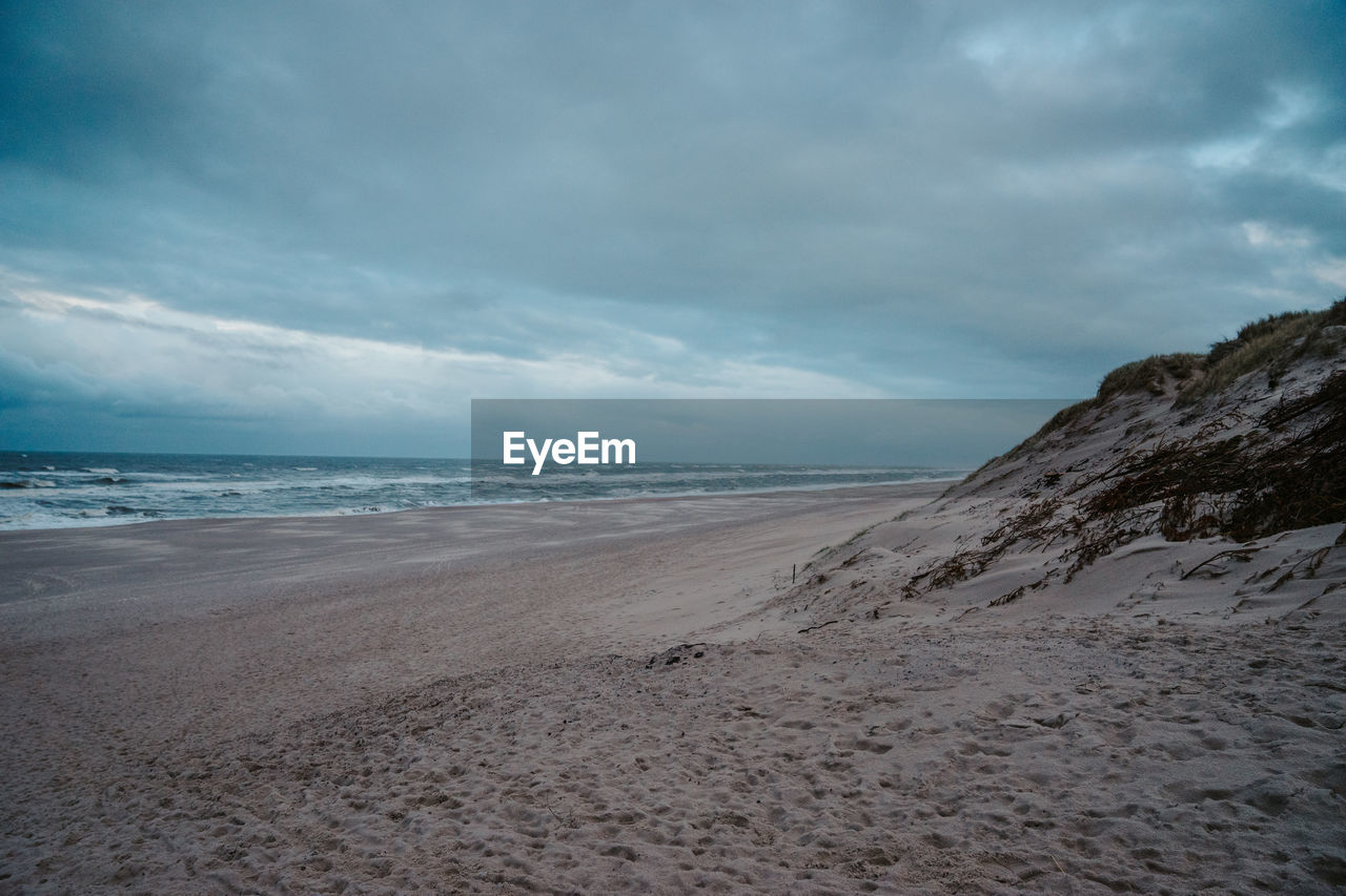 Scenic view of beach against sky