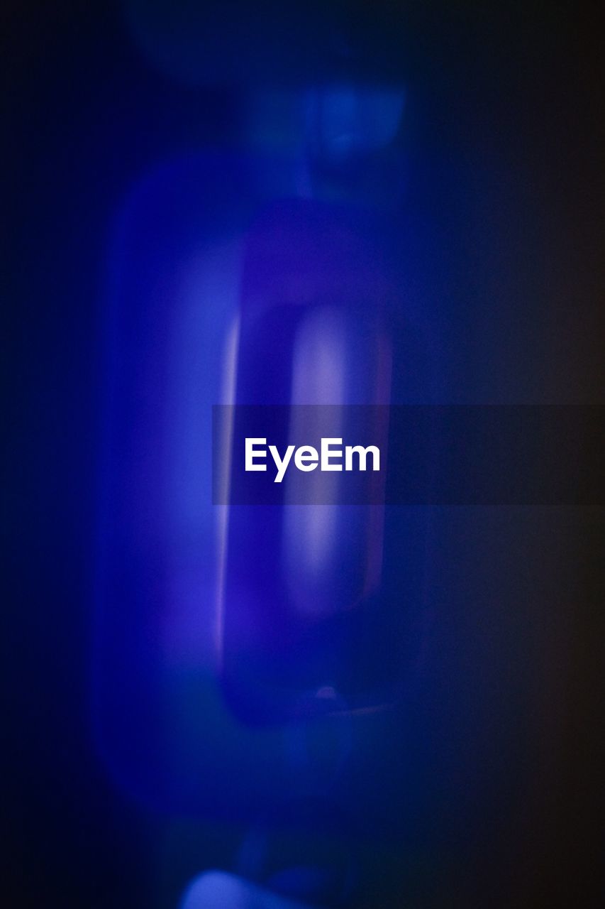 CLOSE-UP OF LAMP OVER BLACK BACKGROUND