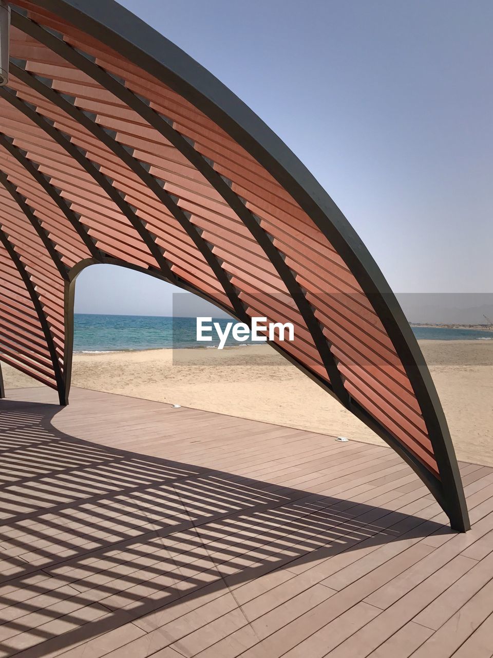 View of beach against clear sky