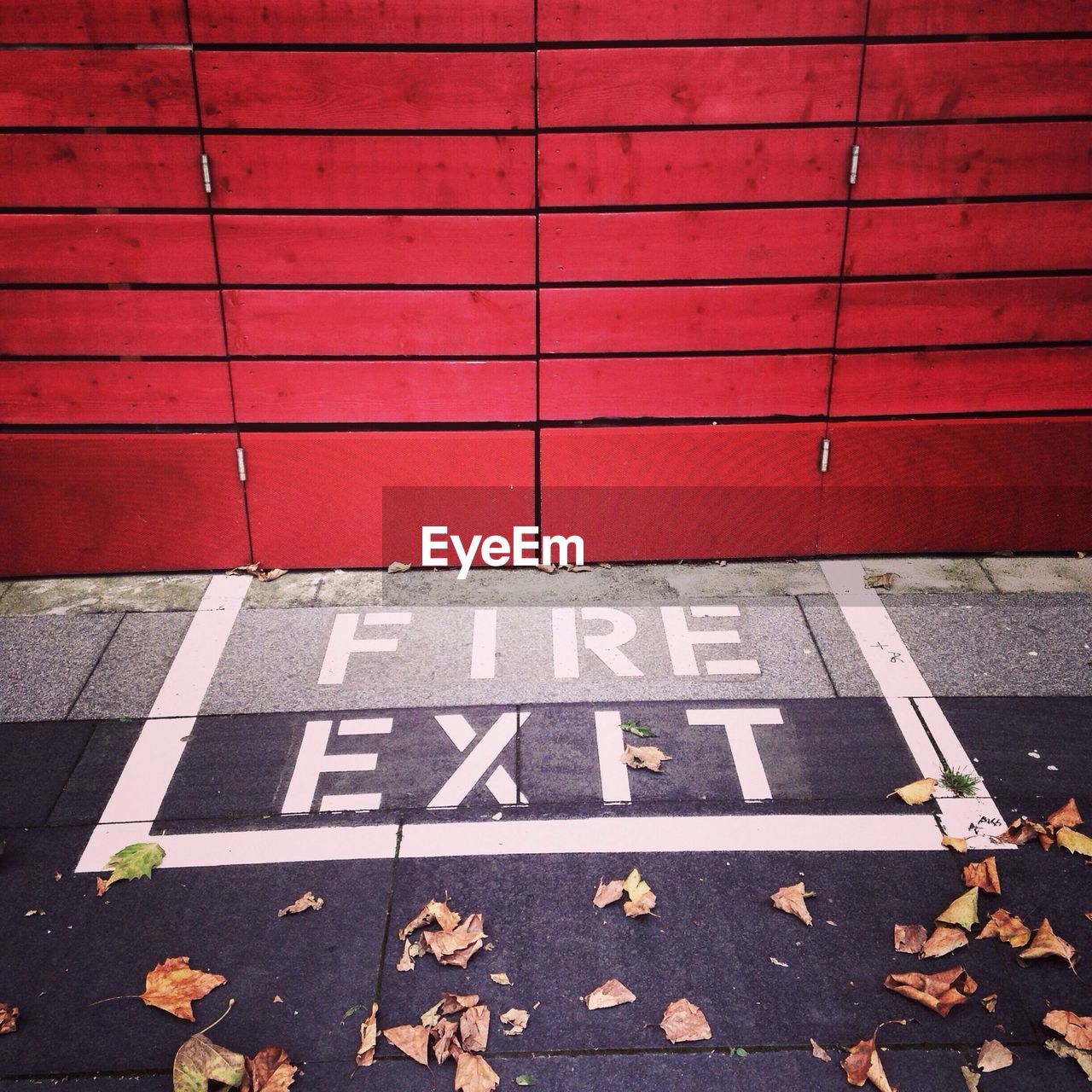 Fire exit of red wooden building