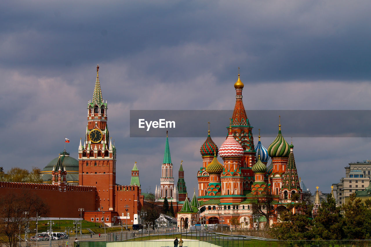 Cathedral of buildings against sky in city