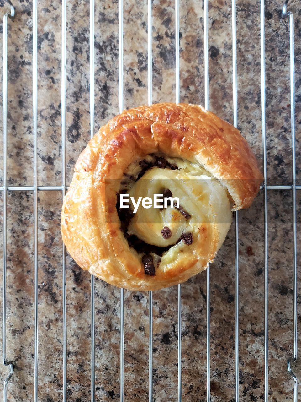 High angle view of pastry on wire cooling rack